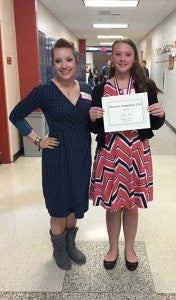Julie Ginn, right, LMS eighth-grader, who won third place in demonstration is pictured with Jessi Fleisher, LMS demonstration coach.