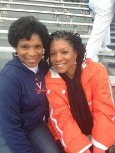 Photos provided by Linda Baskerville Poole From Left, Linda Baskerville Poole and Loria Baskerville Yeadon at a UVa Football game. The pair were the first of four in the family to attend UVa.