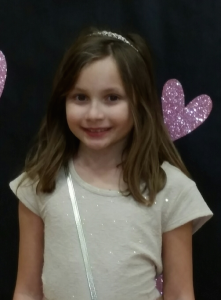 Third-grade student Piper Long smiles during the dance.