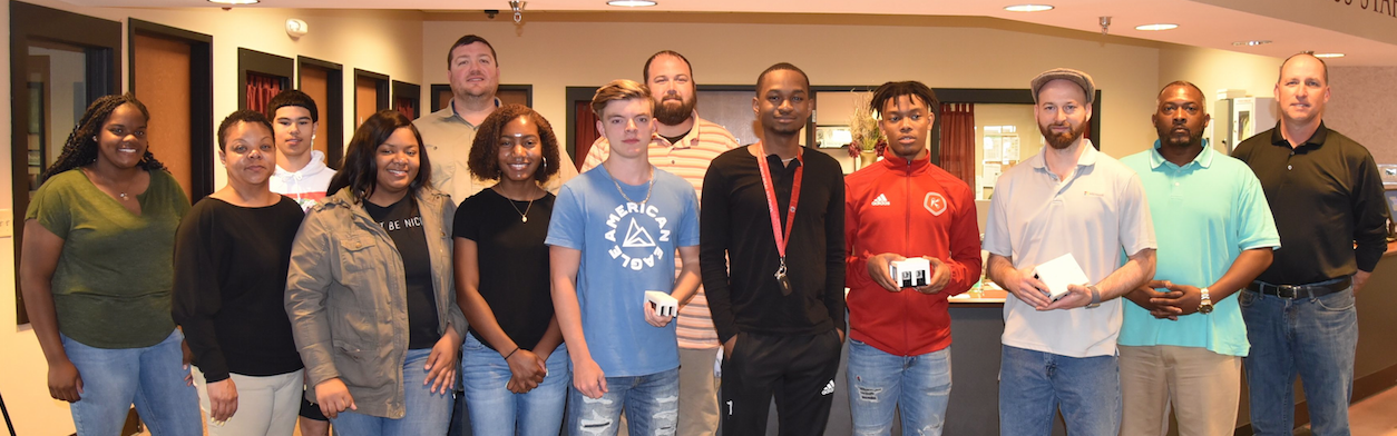 Those who worked on the prototype insulator project are pictured, from left, Desmyn Owens, Tiffany Broadnax-Bacon, Jordan Wesson, Bryana Murphy, Philip Poole, Ayanna Coleman, Ronnie Boyter, John Mize, Kiman McCarthy, Seita McCarthy, Justin Stansell, Vincent Brown and Scott Edmonds.